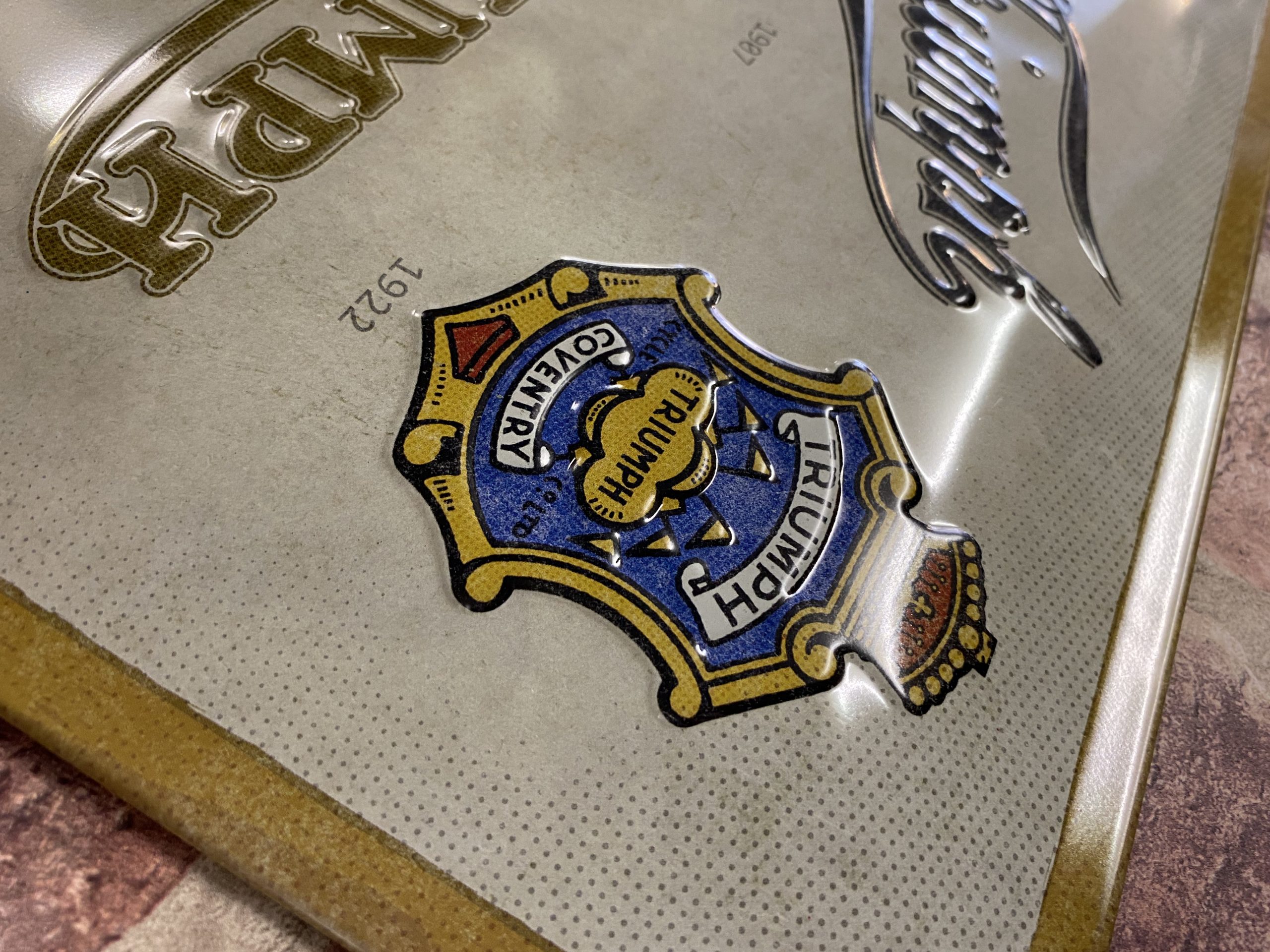 Metal Sign Embossed Large, Triumph Logo Evolution - Image 3