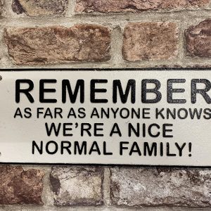 Cast Iron Wall Sign Remember We're A Normal Family