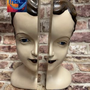 Deco Style Antiqued Split Head Bookends pair (Small Scratch On Edge Of Base)